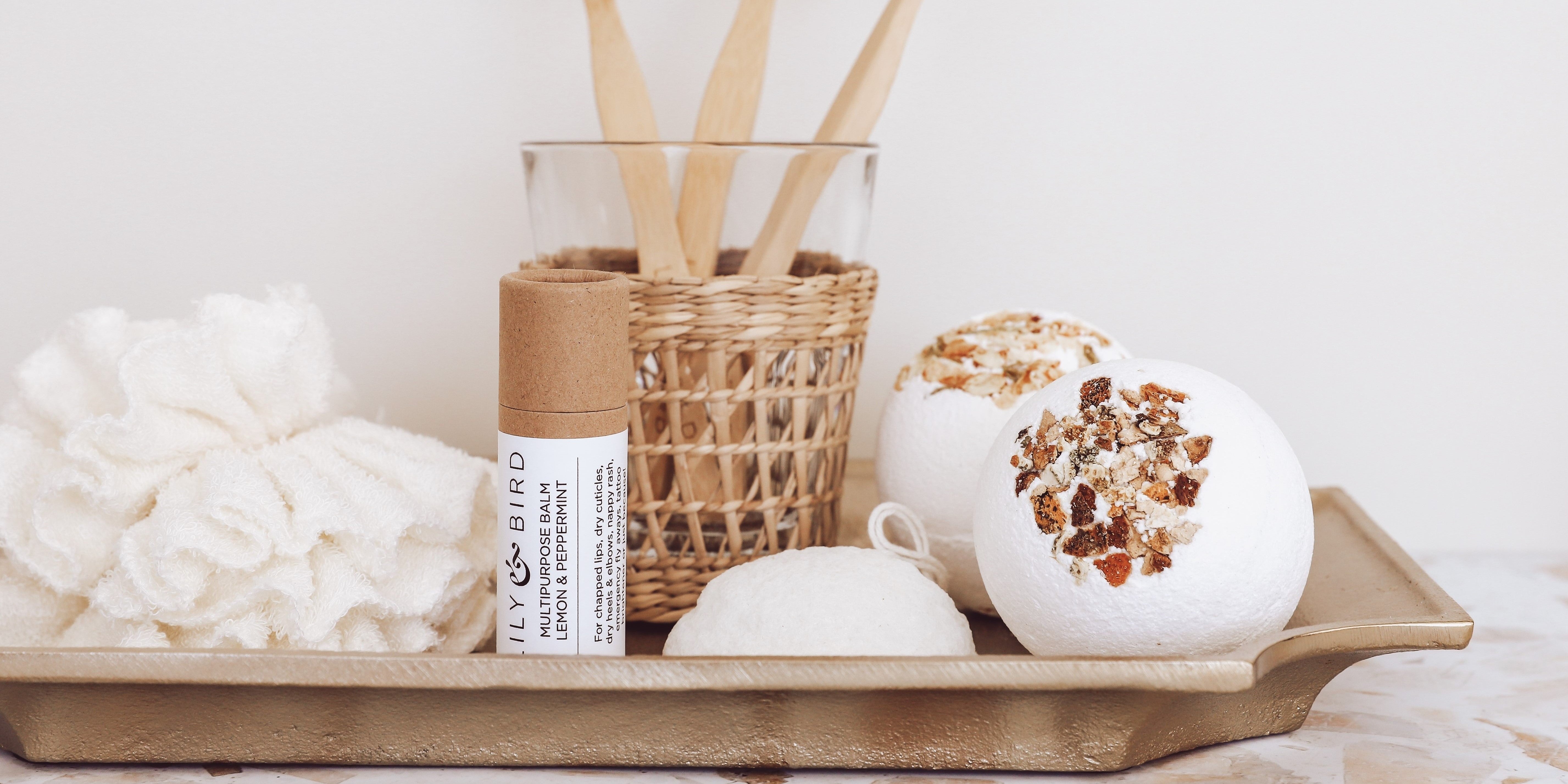 Bath Bombs & Multipurpose Balm placed on a decorative platter